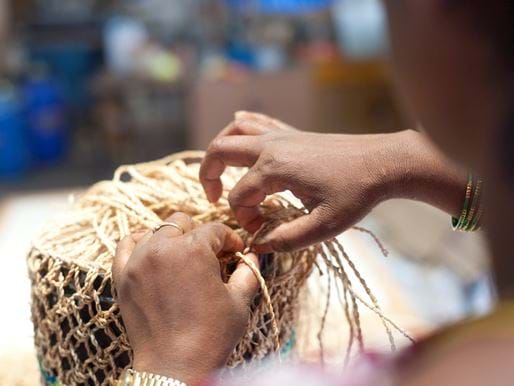 Lady weaving, India