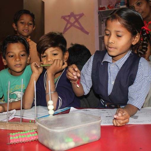 Group of children in class, India
