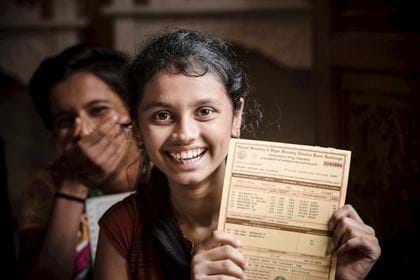 Girl with certificate, India