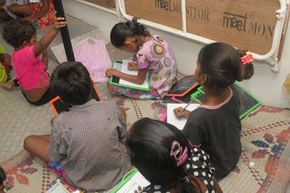 children in classroom, India
