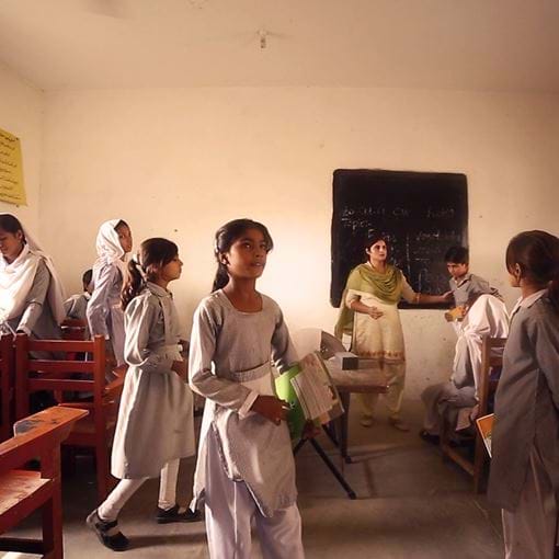 Children being interactive in classroom, Pakistan