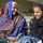 Two women laughing together, Pakistan