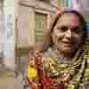 Woman in front of urban background, Pakistan