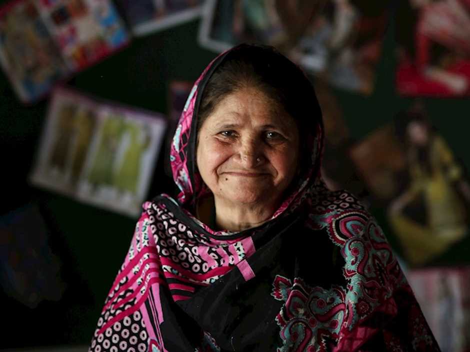 Lady staring into the camera , Pakistan