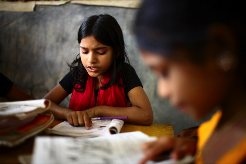 girl reading in class 