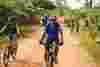 supporter riding bikes in Cambodia 