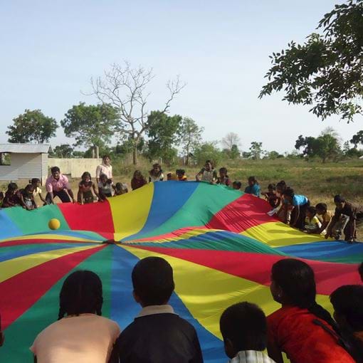 children in a circle at workshop in Sri Lanka