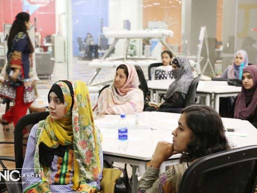 Women sat in a classroom, Pakistan