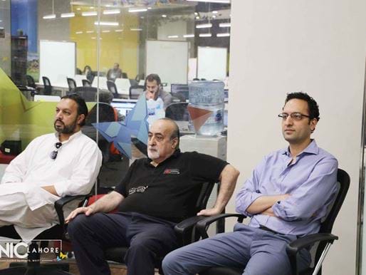 Men sat in classroom